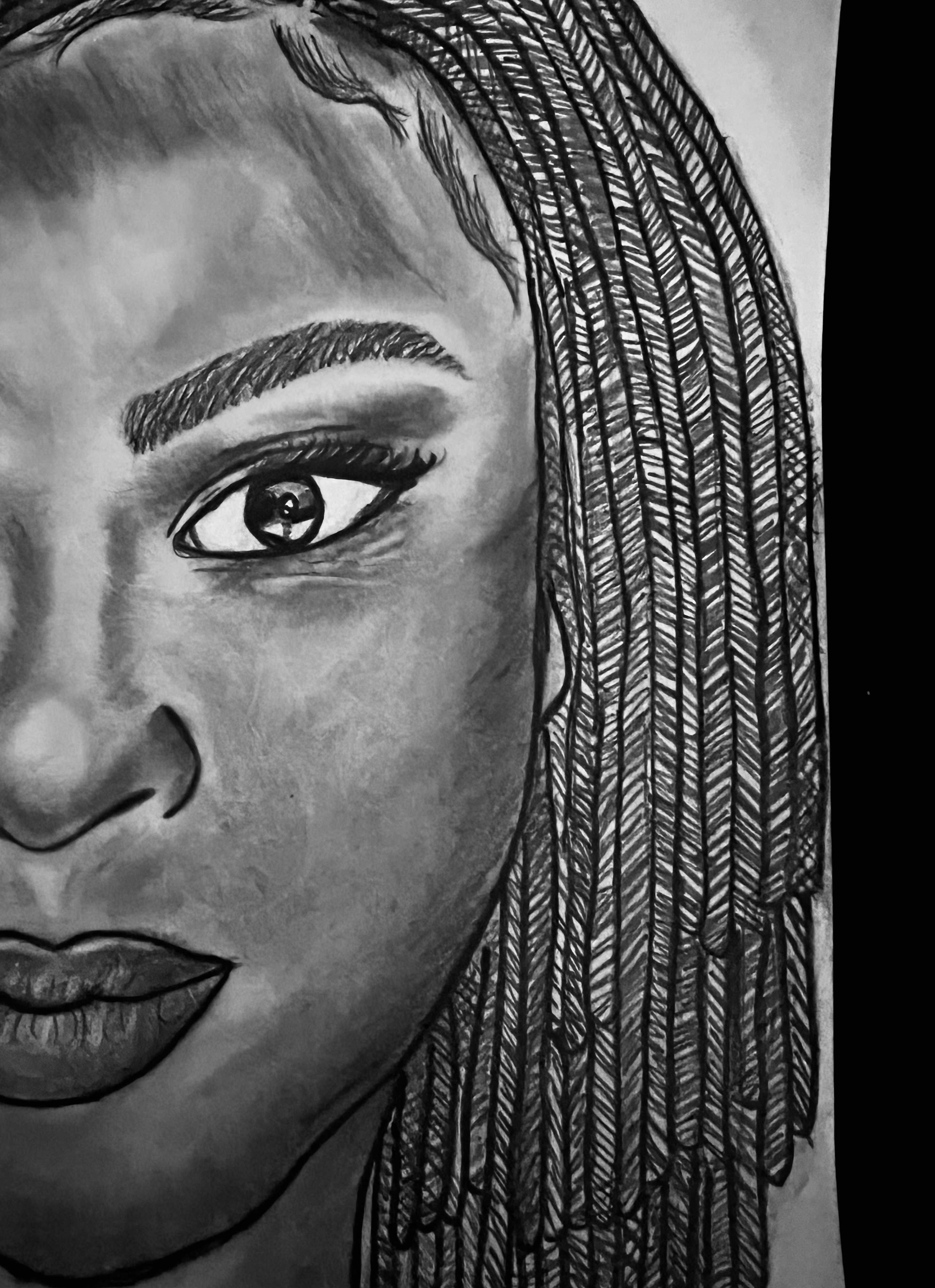 Detailed black and white pencil drawing of a woman's face with braided hair, showcasing intricate shading techniques and careful attention to facial features